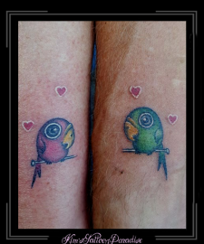 kissing birds love tattoo